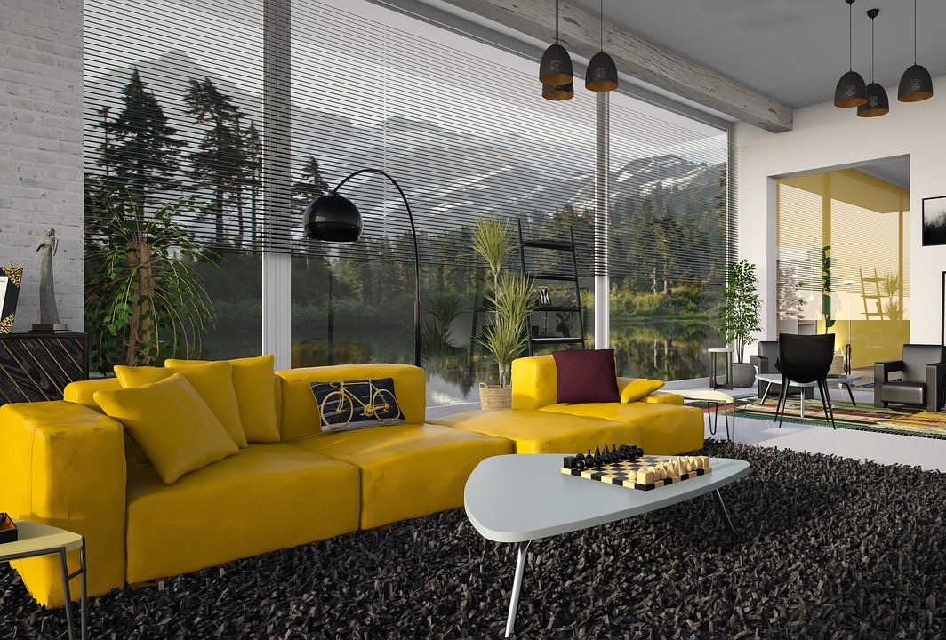 image of a living room with trending 2024 decorative lighting and a yellow sofa